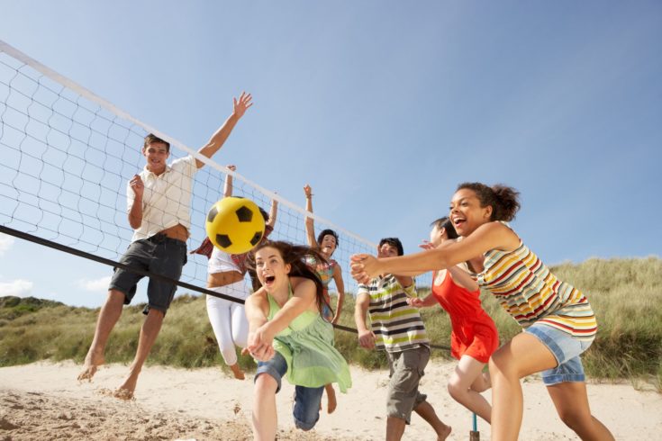 Family playing volleyball