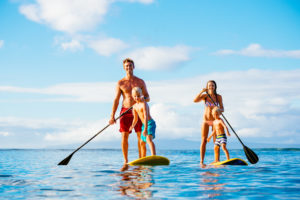 Family Stand Up Paddleboards on the beach