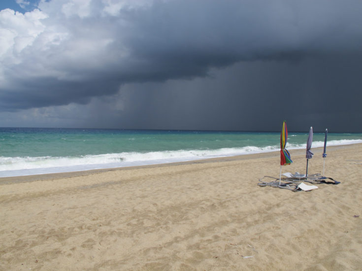 Seascape.,Sand,Beach,.,A,Thunderstorm,Is,Approaching.,Dark,Clouds