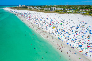 Aerial view of a crowded beach on siesta key