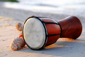 Small drum laying on the beach