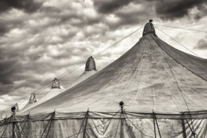 Black and white photo of circus big top tent