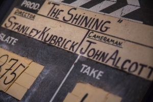 LONDON, ENGLAND - MAY 2019: An original clapper board from the Stanley Kubrick adaptation of The Shining It is on display along with other pieces at the Design Museum in Kensington.
