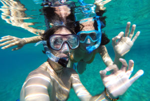 Young couple snorkeling