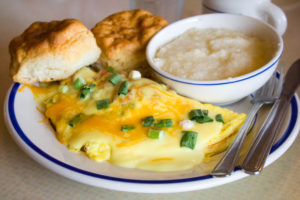 Cheese Omelet Breakfast with Onions and Hollandaise Sauce