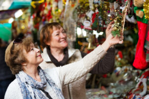 Women browsing for holiday decor